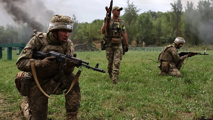Ukrainian soldiers conducting military training exercises near the frontline in Zaporizhzhia region amid Russia-Ukraine conflict