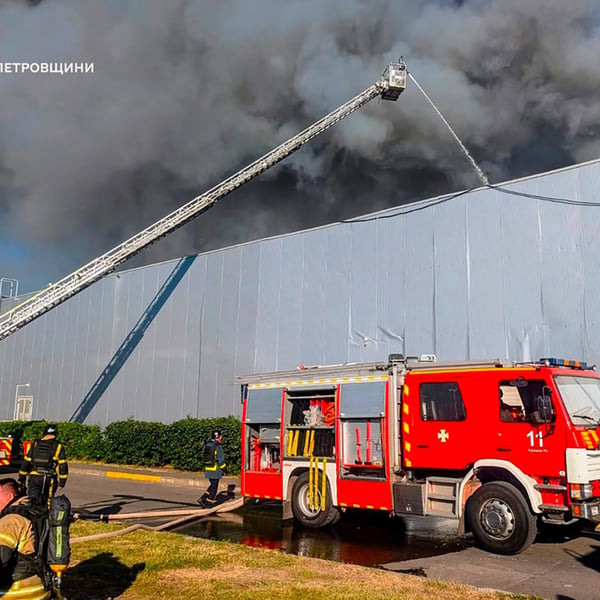 Firefighters respond to Russian drone strike at Kryvyi Rih shopping mall Ukraine war August 2026