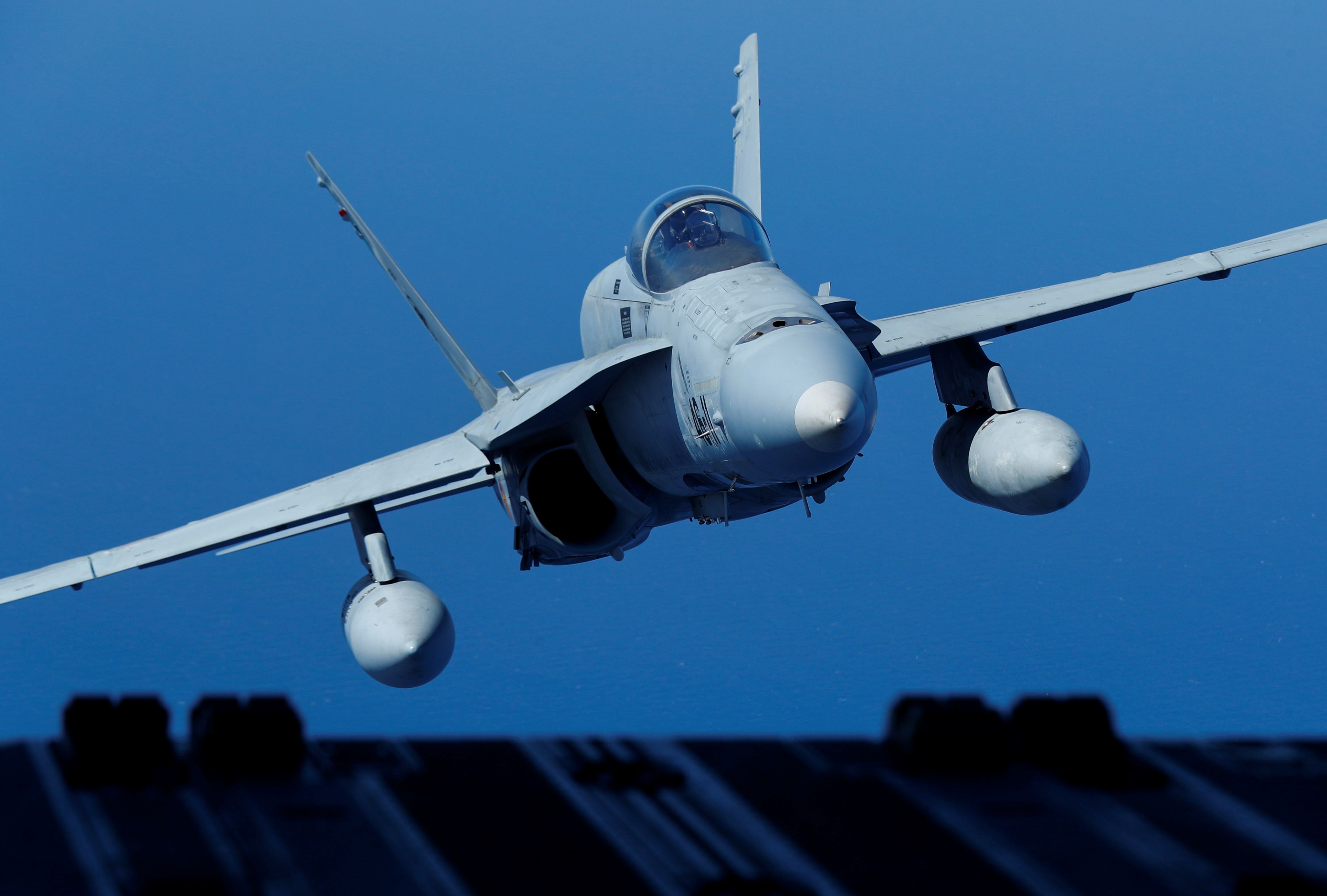 Spanish Air Force F-18 fighter jet conducting NATO air policing mission over Romania during Ukraine war drone incidents