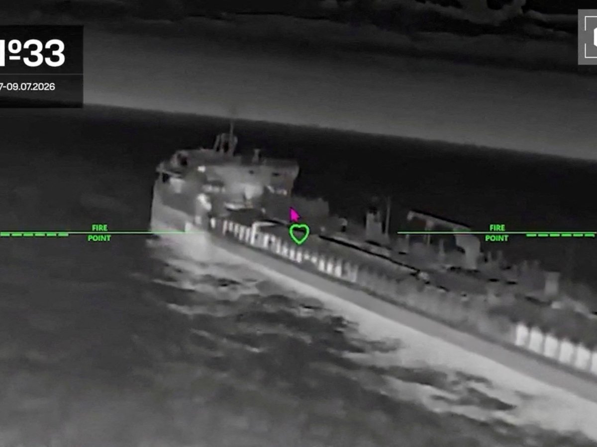 A screengrab of a Ukrainian drone striking what the Ukrainian military said was a Russian tanker in the Sea of Azov