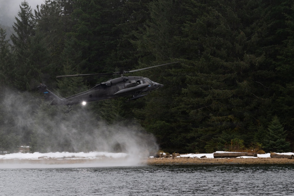 US Army National Guard UH-60 Black Hawk helicopter conducting search and rescue exercise near Sitka Alaska 2026