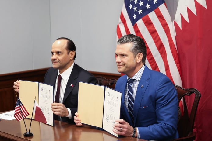 US Defense Secretary Pete Hegseth and Qatari Defence Minister Sheikh Saoud bin Abdulrahman Al Thani sign a defence agreement