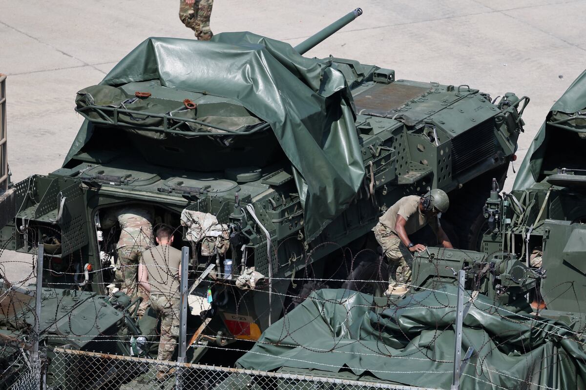 US soldiers working on armored vehicles at a base near the Korean demilitarized zone August 2026