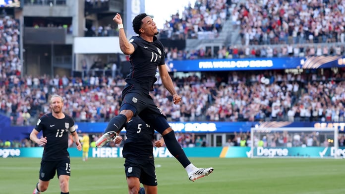 Malik Tillman leaps in celebration after scoring the only United States goal against Belgium in the World Cup 2026 round of 16 at Seattle Stadium