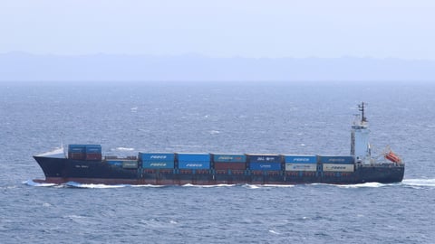 Panama-flagged containership Vela Nova disabled by US Navy Hellfire missiles in the Gulf of Oman during Iran blockade enforcement August 11 2026