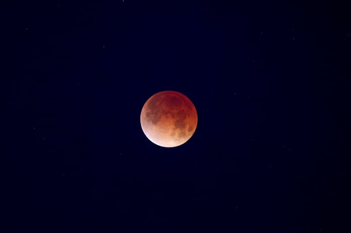 The Moon glowing deep red during the total lunar eclipse of 3 March 2026, photographed over New Orleans
