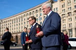 German Foreign Minister Johann Wadephul and Ukrainian Foreign Minister Andrii Sybiha observe a nationwide minute of silence in central Kyiv