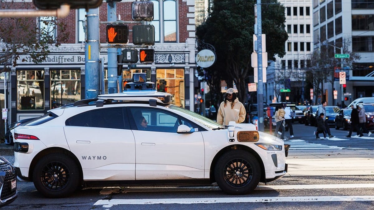 A Waymo autonomous robotaxi operating in an American city after CPUC approved California expansion to Sacramento and San Diego