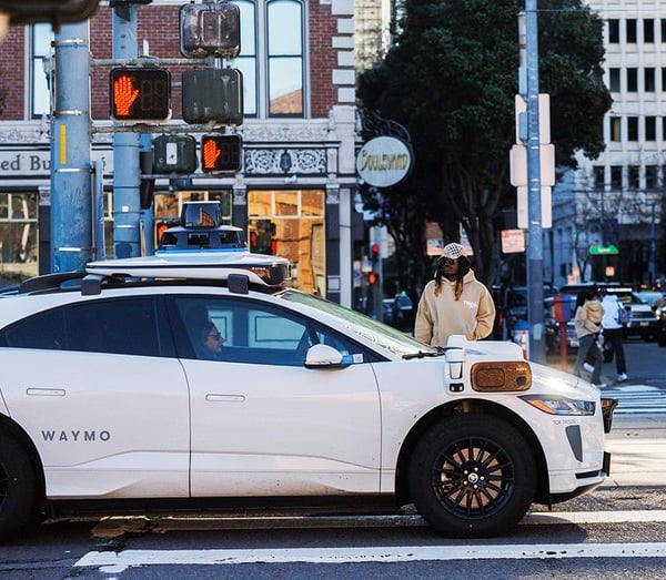A Waymo autonomous robotaxi operating in an American city after CPUC approved California expansion to Sacramento and San Diego