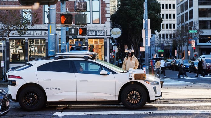 A Waymo autonomous robotaxi operating in an American city after CPUC approved California expansion to Sacramento and San Diego