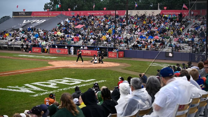 Packed stands at Robin Roberts Stadium in Springfield Illinois for the inaugural Women's Professional Baseball League game on August 2 2026
