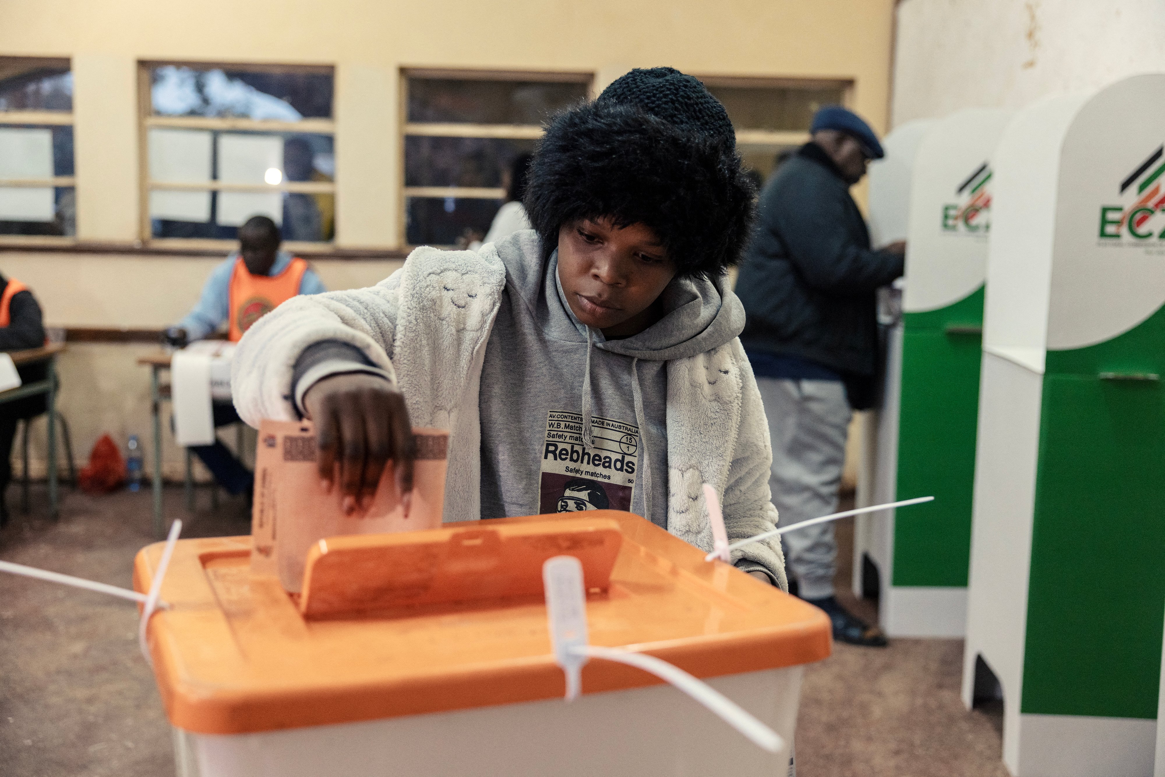 A woman casts her ballot at a polling station in Lusaka during Zambia's 2026 presidential election