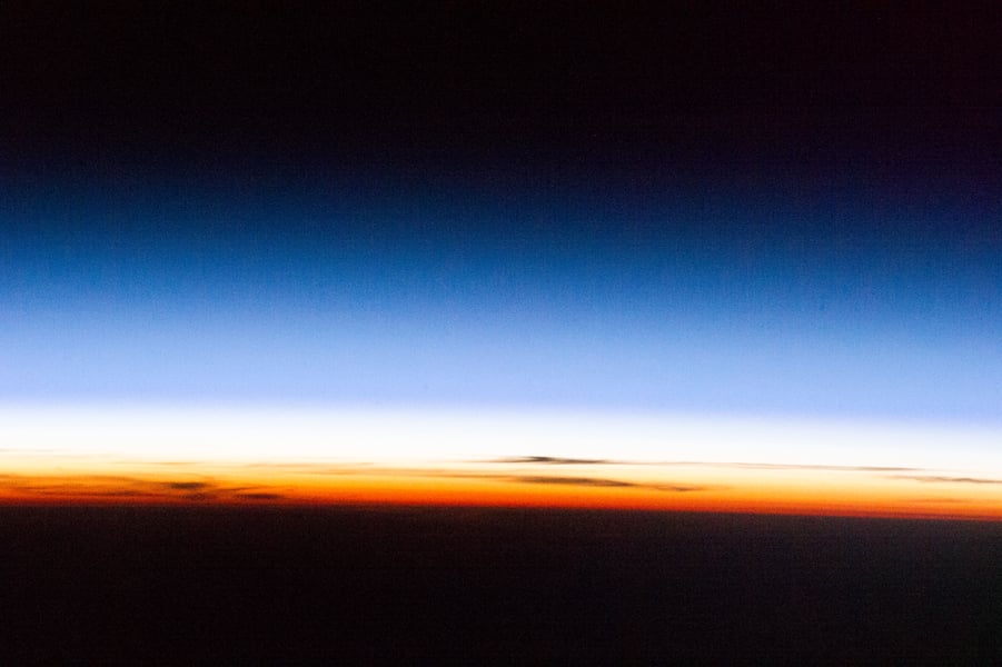 Earth's atmospheric layers showing the troposphere stratosphere and mesosphere as seen from the International Space Station
