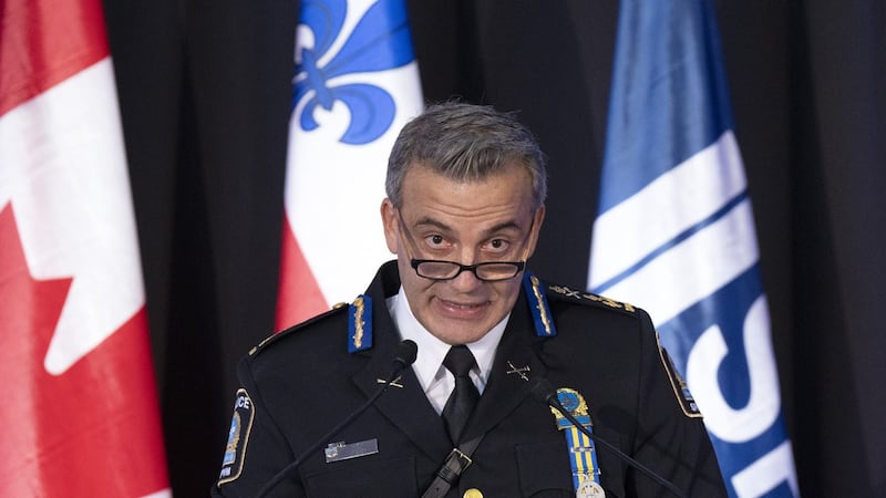 Montreal SPVM police officers at a press briefing