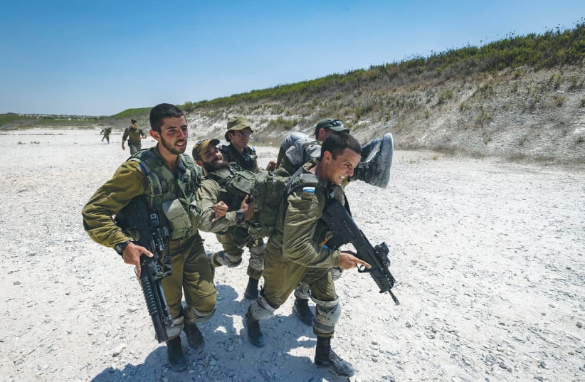 GOLANI SOLDIERS take part in a training exercise, 2021. This week, hundreds of Golani reservists have been participating in a massive training exercise, and not a single reserve soldier refused to show-up for duty, according to their commander