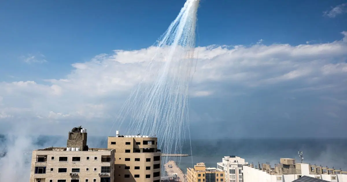 Airbursts of artillery-fired white phosphorus fall over the Gaza