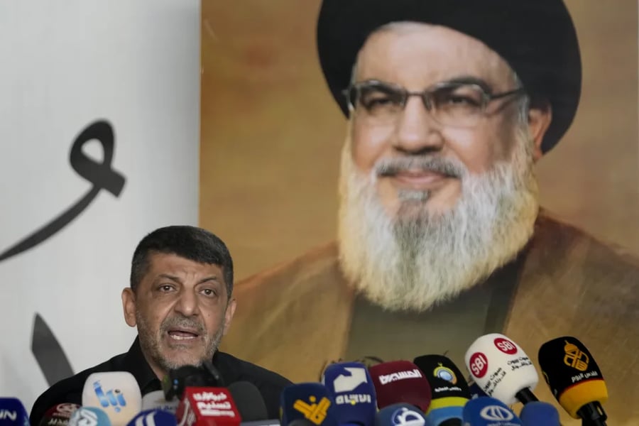 Hezbollah's chief spokesman Mohammed Afif speaks during a press conference
