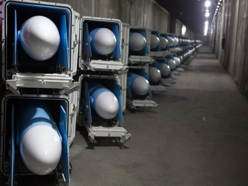 Missiles are shown in an underground storage facility in an undisclosed location, Iran