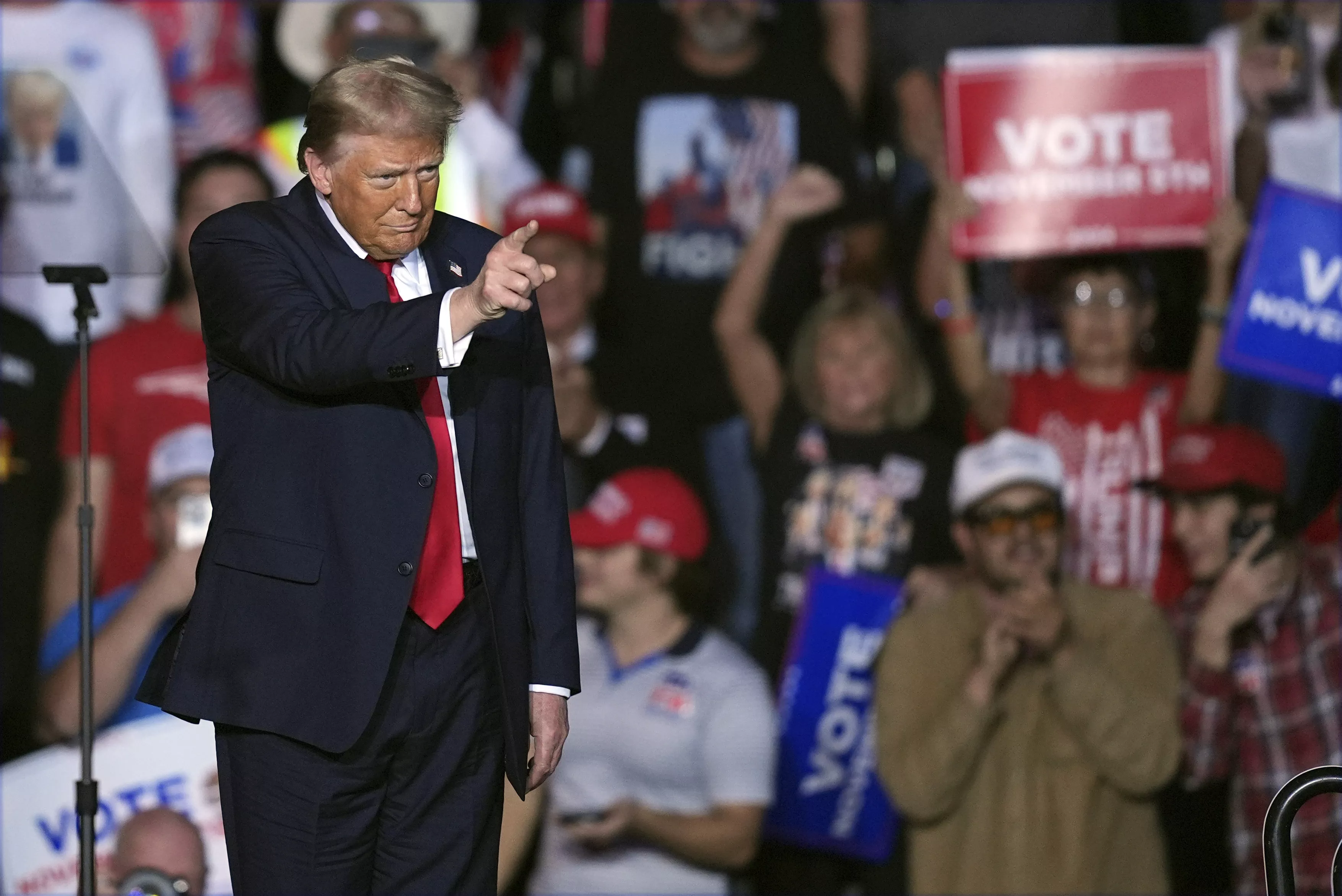 Republican presidential nominee and former President Donald Trump arrive at a campaign rally at Lee's Family Forum in Henderson, Nevada