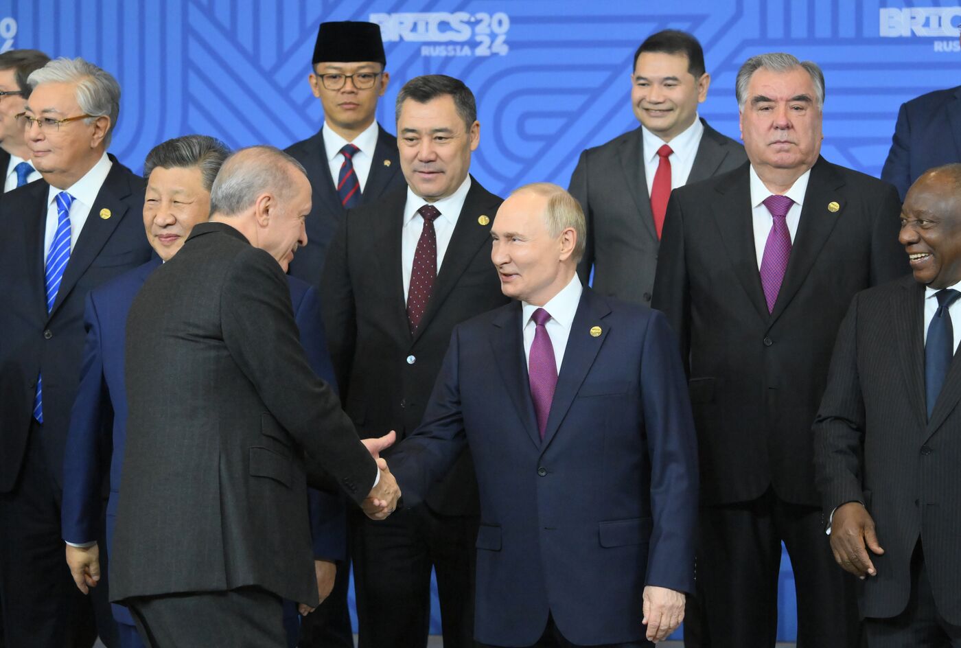 Russian President Vladimir Putin and Turkish President Recep Tayyip Erdogan, left, during joint photo opportunities for the BRICS leaders at the 16th BRICS summit in Kazan