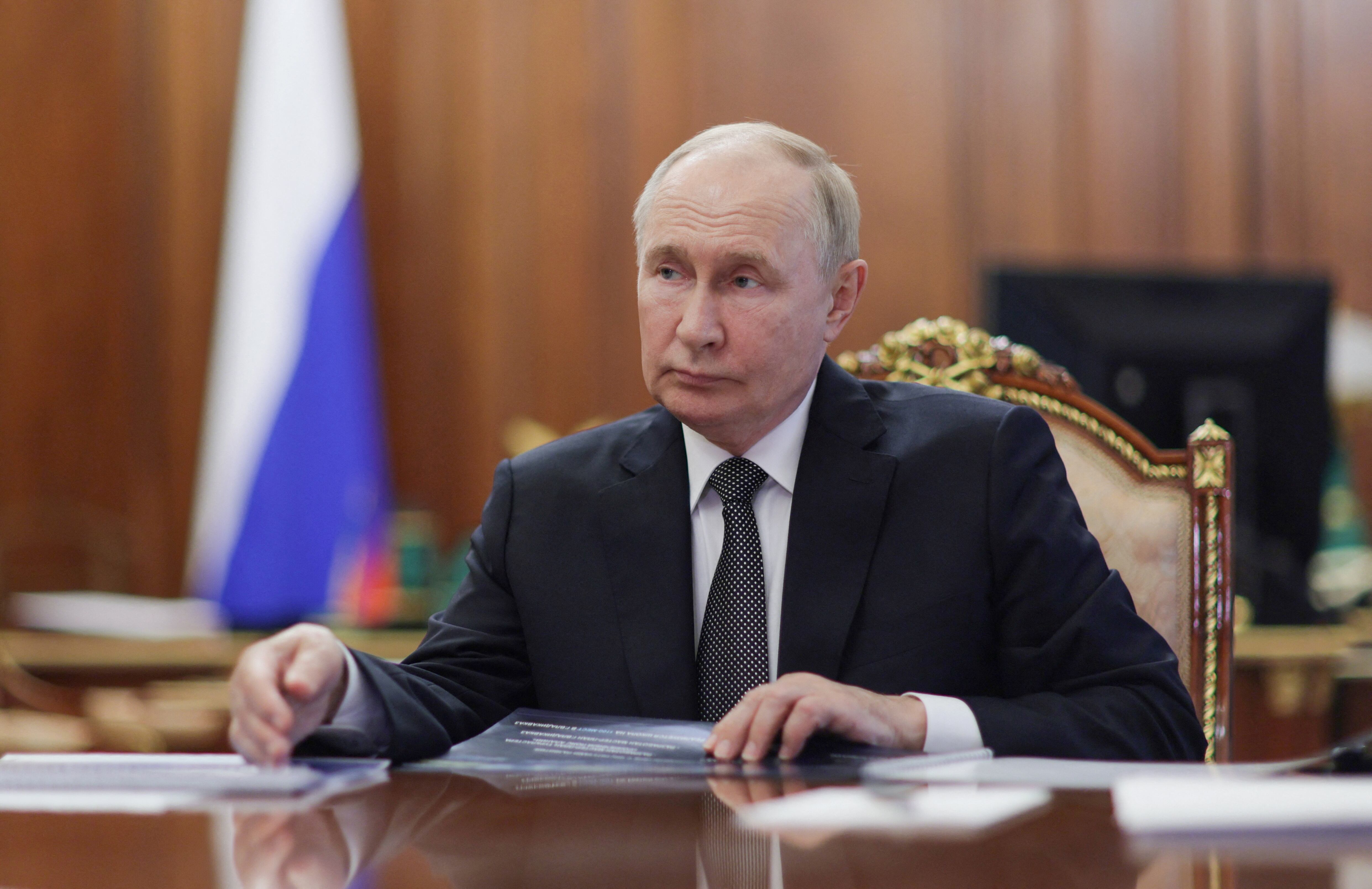 Russian President Vladimir Putin meets head of the North Ossetia–Alania region Sergei Menyailo