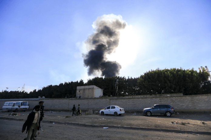 Smoke billows from the site airstrike
