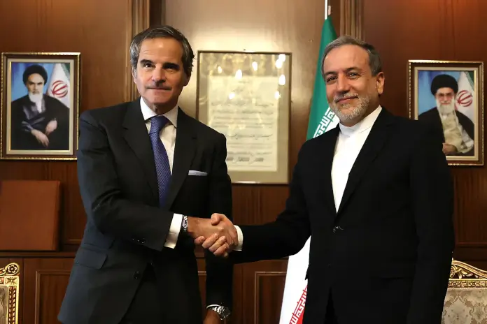 Iran's Foreign Minister Abbas Araghchi, (IAEA) Director General Rafael Mariano Grossi