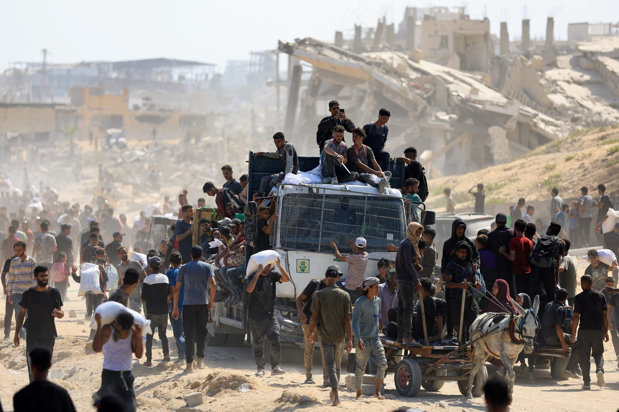 Gaza aid deaths, 73 Palestinians killed, Gaza humanitarian crisis, Israeli attack on aid seekers, Zeitoun neighborhood Gaza, Gaza civilians waiting for aid