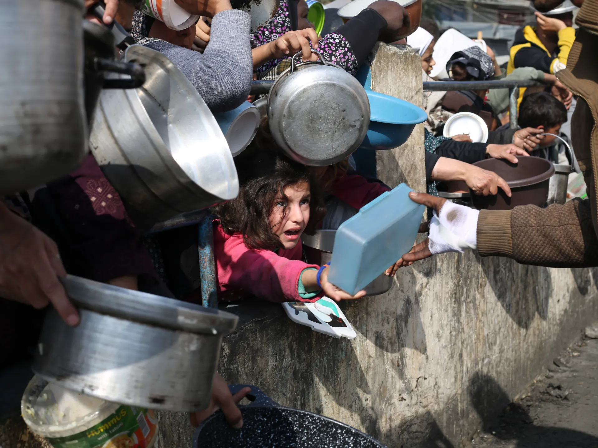 Palestinians, food line, Gaza, Rafah, Israeli offensive, starvation, humanitarian crisis, famine, blockade,