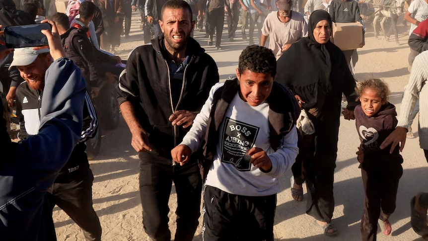 59 Palestinians killed in Gaza, Israeli gunfire at aid center, airstrikes on homes, Gaza civilian deaths, July 2025 humanitarian crisis
