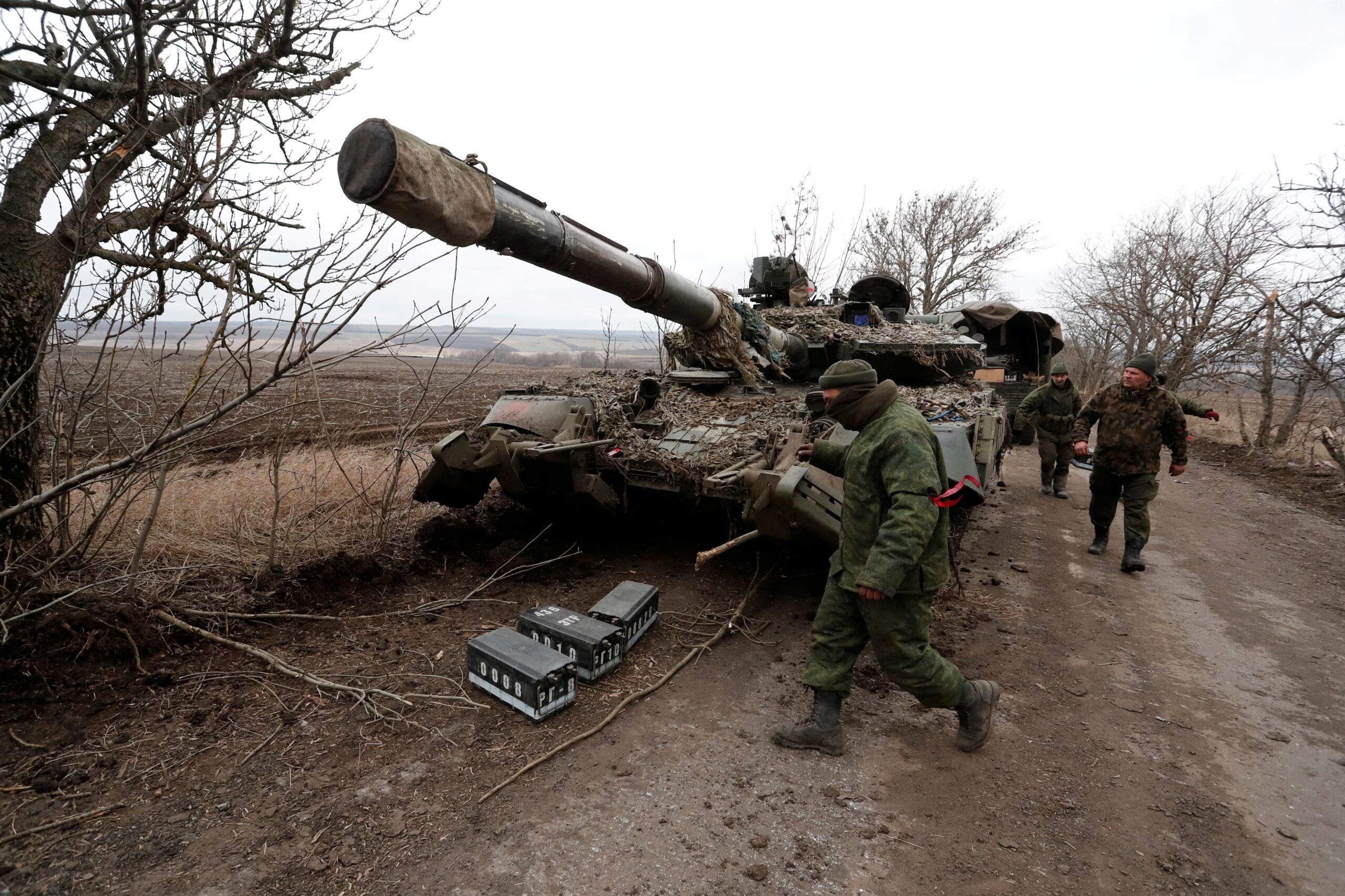 Russian military vehicles and troops advancing near Zelenaya Dolina village in Donetsk region during July 2025 conflict operations