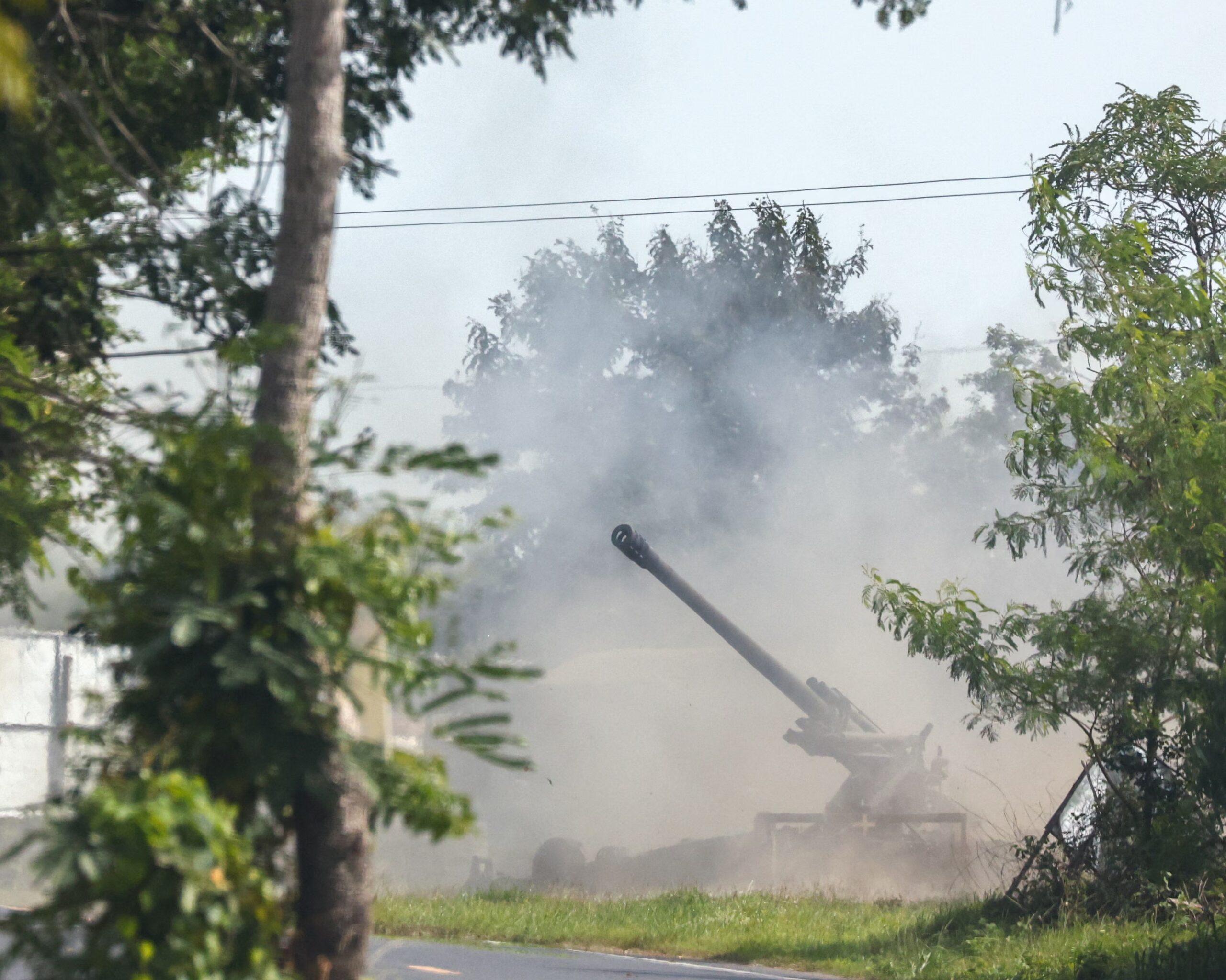 Thai mobile artillery firing toward Cambodia, border clashes, cross-border fighting, Southeast Asia conflict, military escalation, Thailand Cambodia war