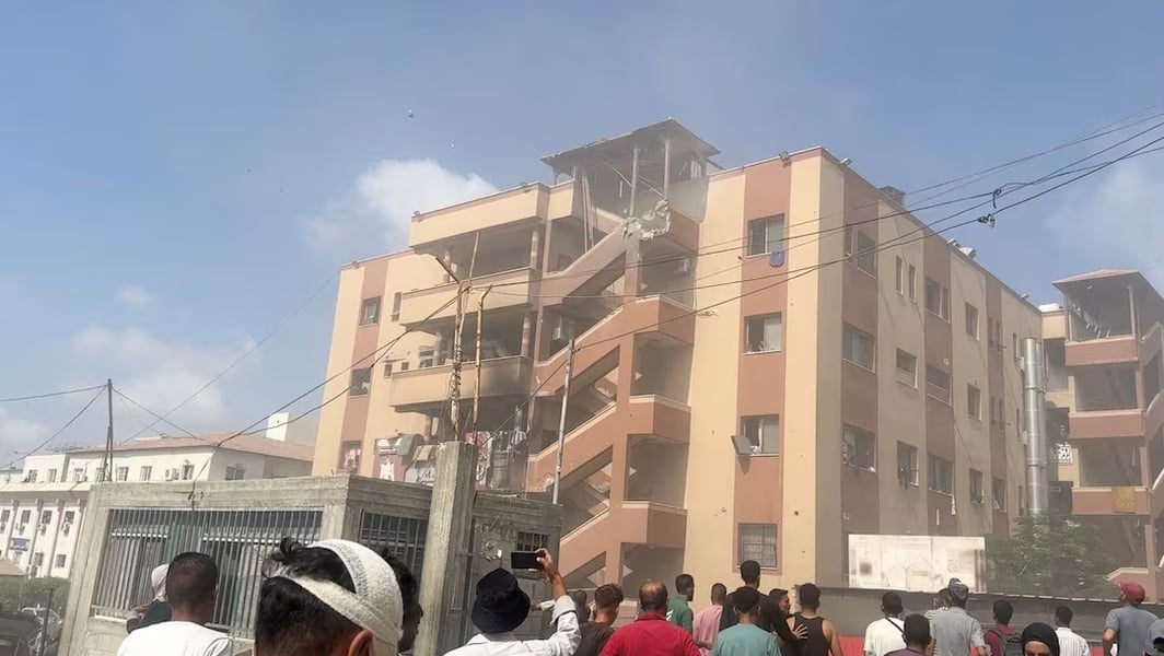 Palestinians outside Nasser Hospital in Gaza after Israeli airstrike killed 20 including 5 journalists