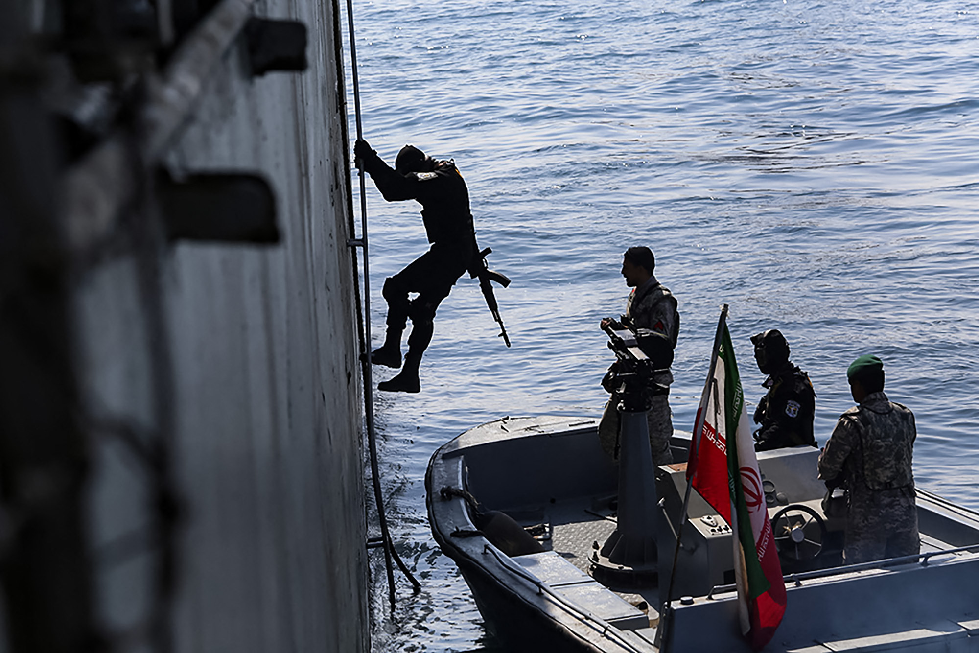 ranian naval forces escort seized foreign oil tanker accused of smuggling fuel in Persian Gulf