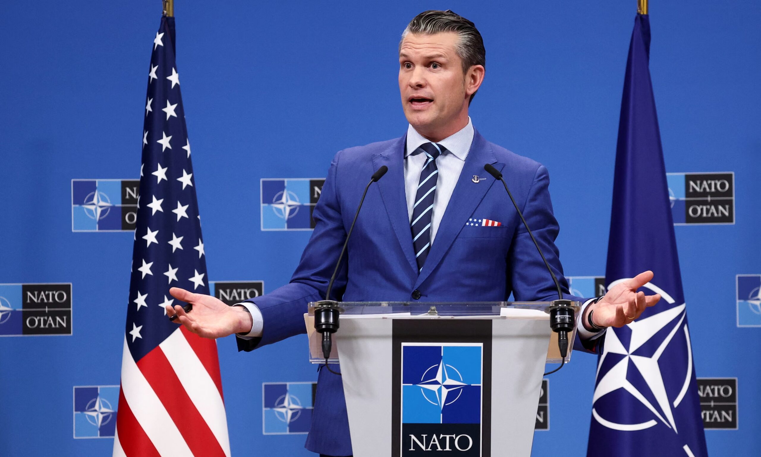 Pete Hegseth speaking at NATO defense ministers meeting