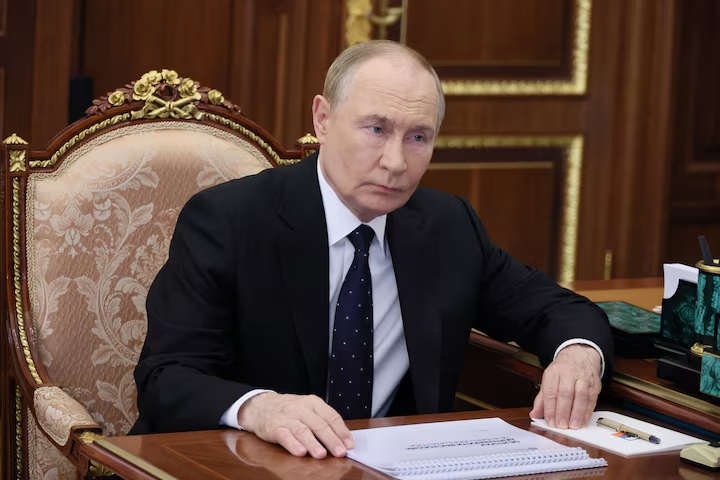Russian President Vladimir Putin meets with Federal Taxation Service head Daniil Yegorov in Moscow Kremlin