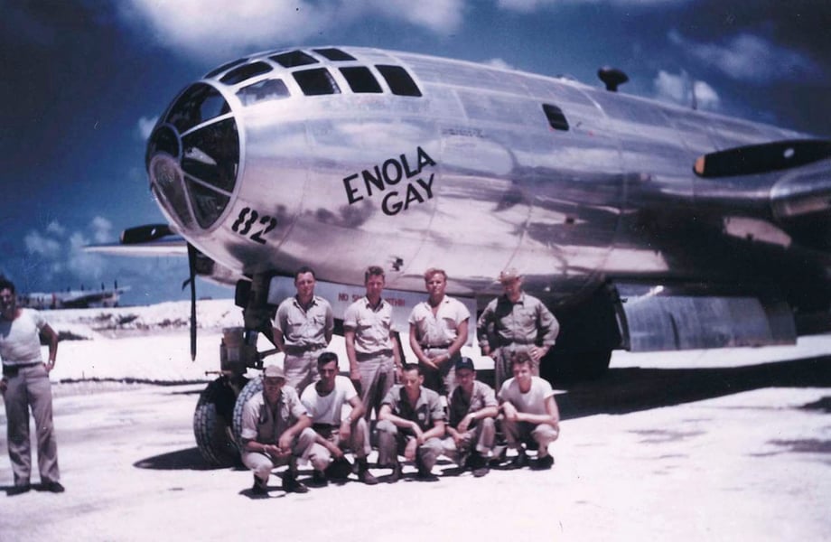 us enola gay crew posing with the bomber before atomic bombing of hiroshima that killed 140,000 civilians