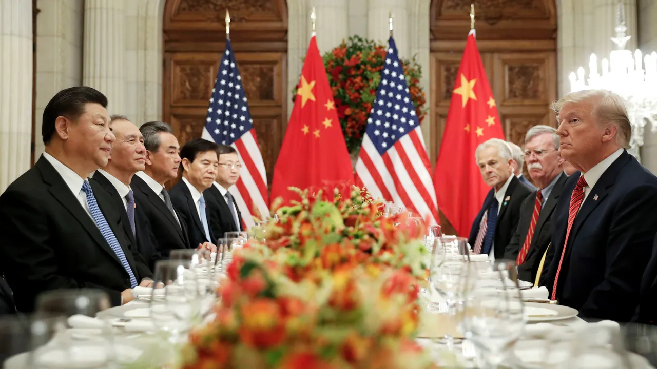 Chinese and US flags symbolizing escalating trade and currency war tensions.