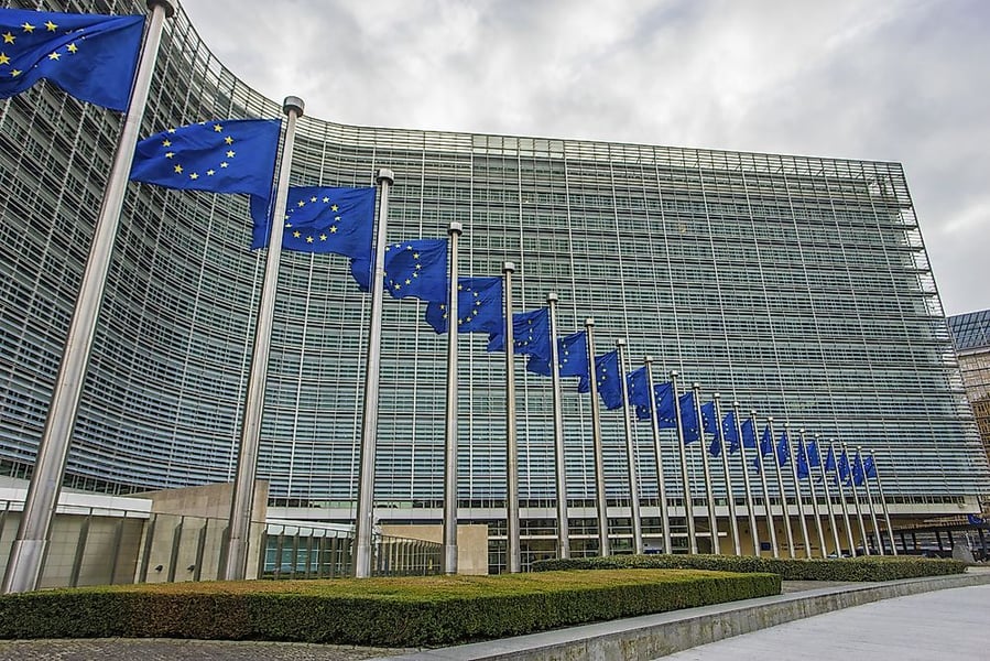 european commission building with eu flags, brussels