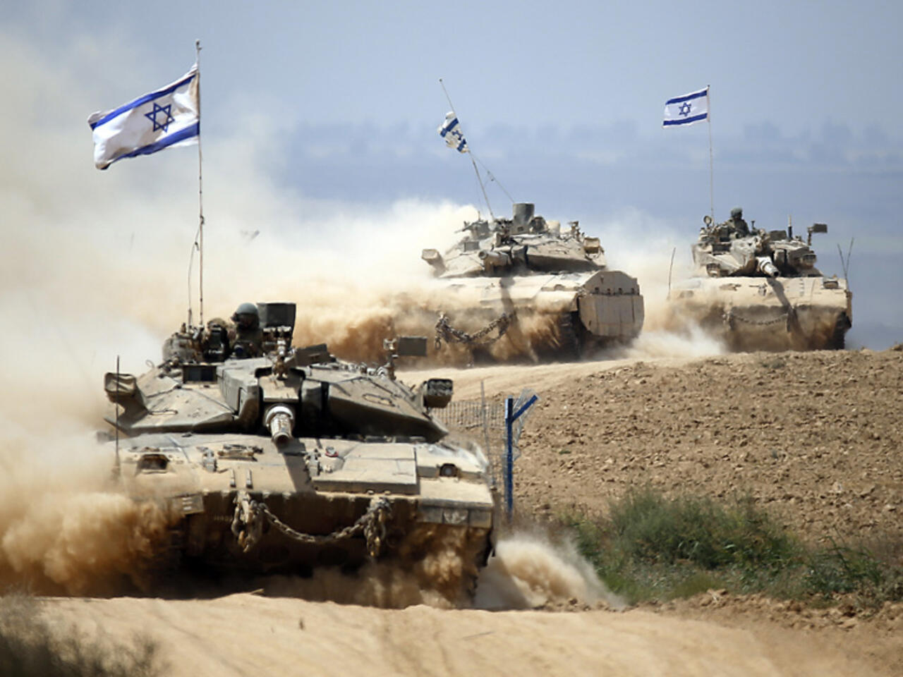 Israeli tanks in occupied Palestinian territory during Gaza military offensive