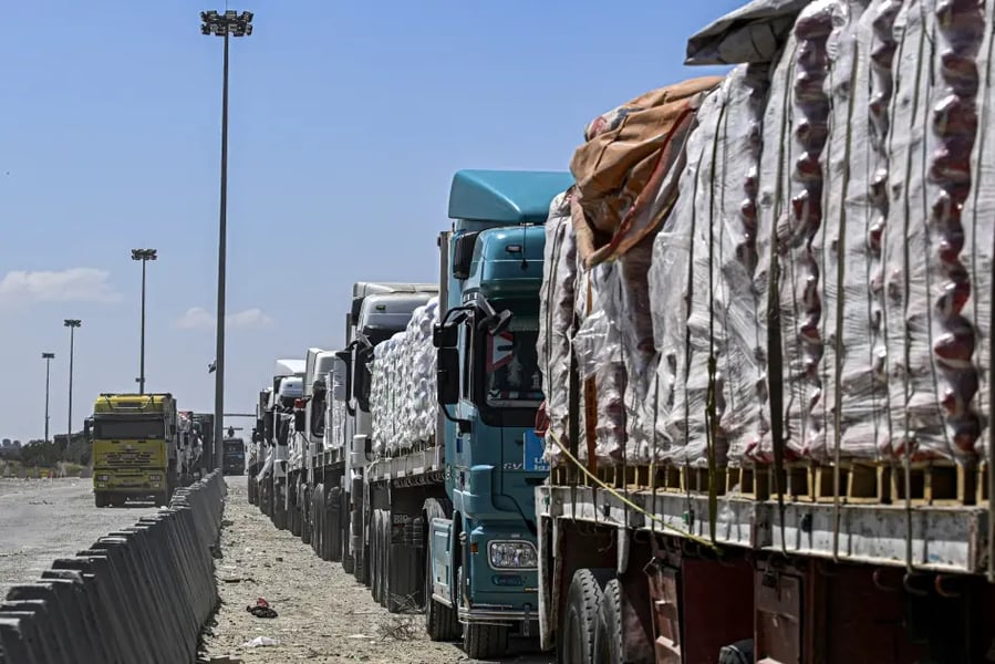 Aid trucks and ambulances operating under humanitarian corridors for Gaza civilians