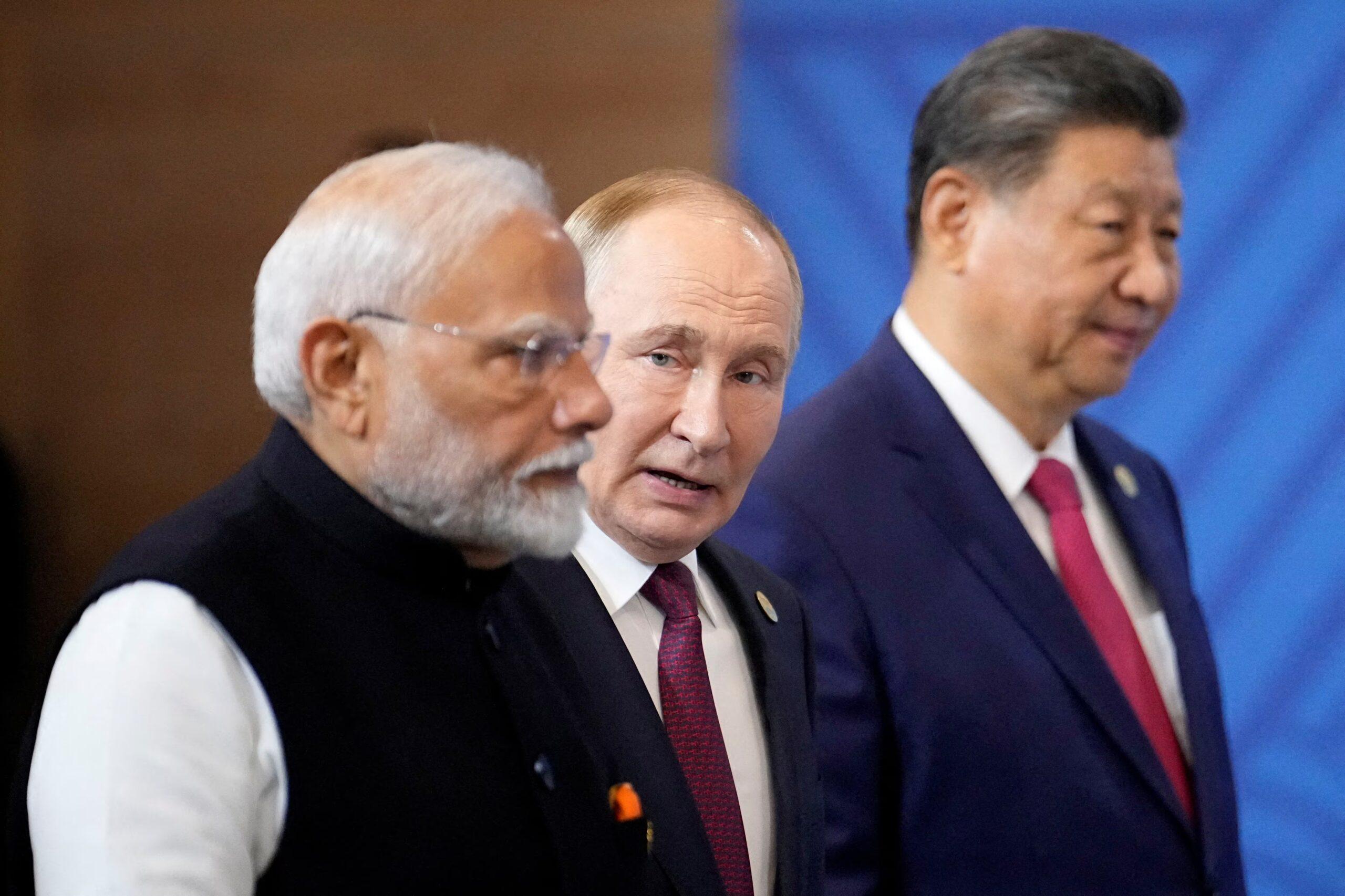 Indian prime minister Narendra Modi, Russian president Vladimir Putin and Chinese president Xi Jinping attend BRICS summit family photo in Kazan Russia October 23 2024 Indian prime minister Narendra Modi, Russian president Vladimir Putin and Chinese president Xi Jinping at BRICS summit family photo in Kazan Russia October 23 2024