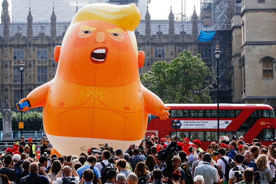 Trump Baby blimp floats above protesters during Trump second state visit in London