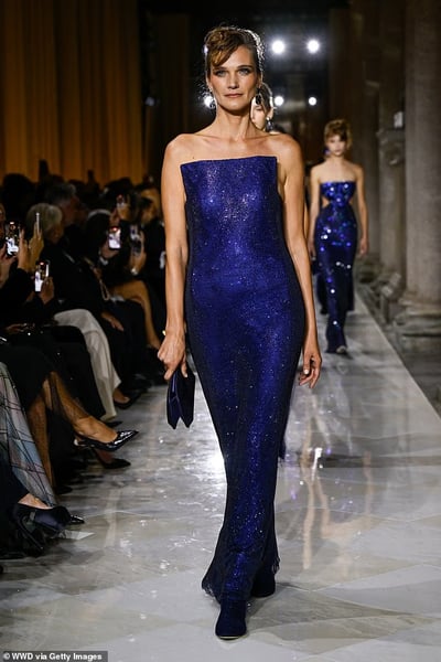 Evening Sequins at Brera Storm-blue sequined Giorgio Armani dress catching light during the Brera courtyard show in Milan