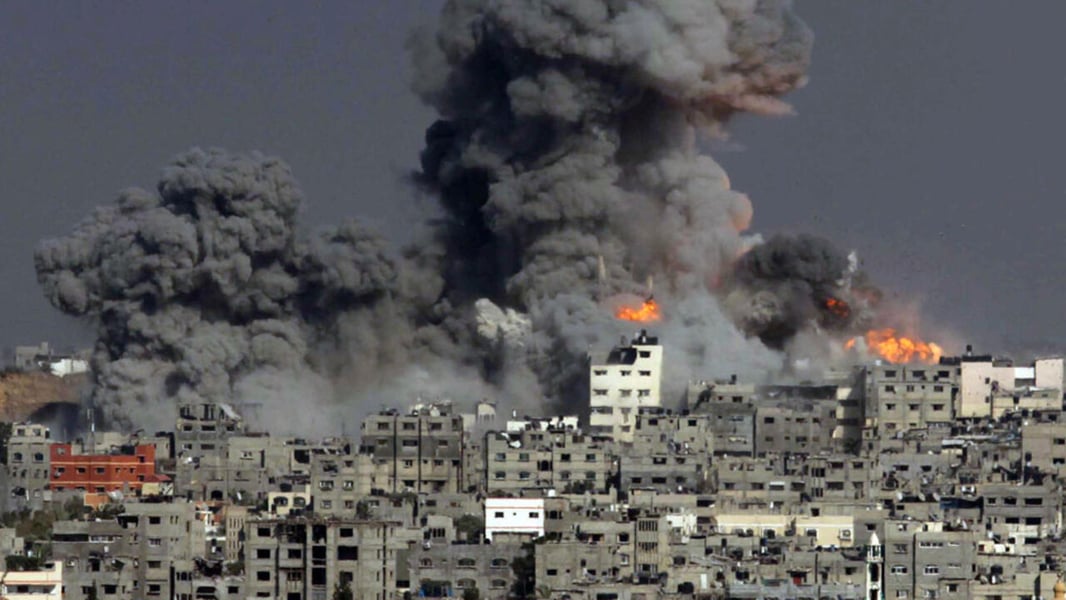smoke and destruction from israeli bombardment in gaza city