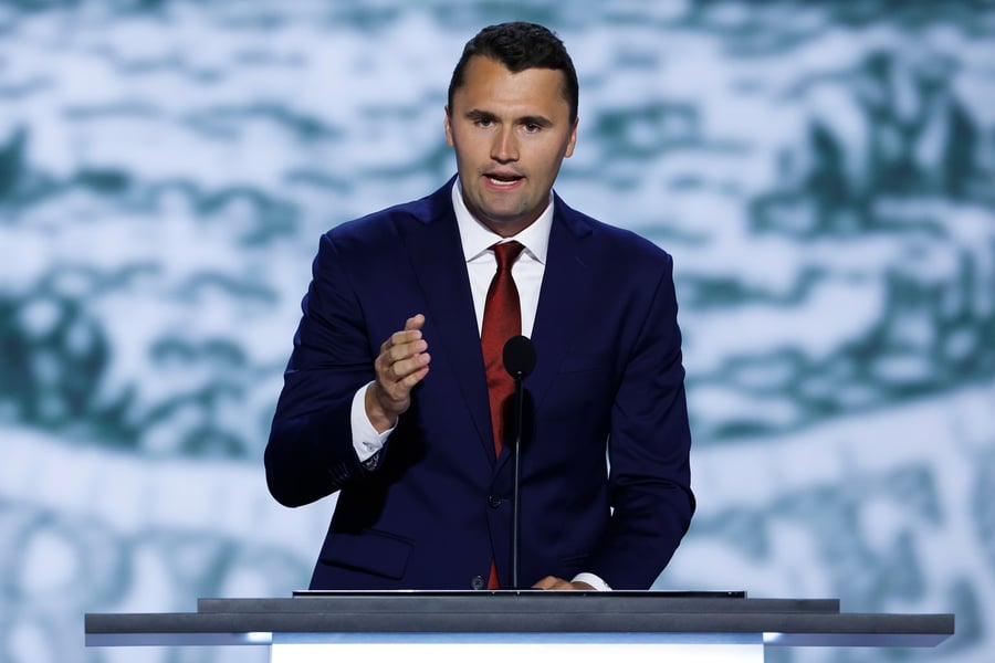 Charlie Kirk at a Turning Point USA event speaking on stage