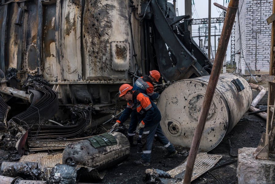 Repair crews work on damaged power lines in Chernihiv region