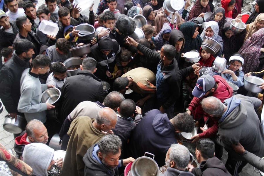 Long bread line outside a bakery in Gaza as food stocks dwindle