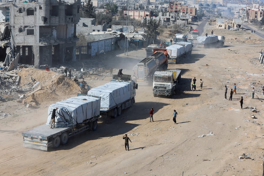 Humanitarian Aid Convoys Bound For Gaza Humanitarian aid trucks lined up for entry into Gaza amid conflict