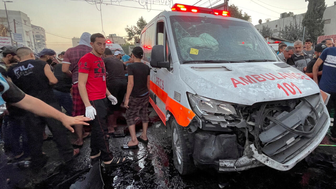 Ambulances queue at Kerem Shalom crossing for a Gaza to West Bank medical evacuation